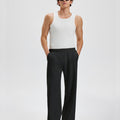 Loose fit black sweatpants for men, full outfit. Casual men's sweatpants front look.