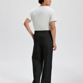 Cotton black sweatpants for men, back view. Elastic waistband and back pocket.