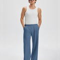 Loose fit blue sweatpants for men, full outfit. Casual men's sweatpants front look.