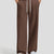 Men's coffee baggy sweatpants, front view. Wide leg sweatpants men, showing fit and drape.