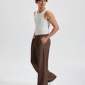 Men's coffee wide leg sweatpants, side view. Baggy pants men with roomy fit.