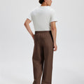Cotton coffee sweatpants for men, back view. Elastic waistband and back pocket.