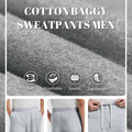Men's light grey baggy sweatpants details: fabric, drawstring, elastic waistband and pocket.