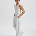Men's white grey wide leg sweatpants, side view. Baggy pants men with roomy fit.