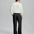Back view of wide-leg trousers: elastic waistband and rear pockets ensure comfort without compromising silhouette.