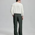 Back view of wide-leg trousers: elastic waistband and rear pockets ensure comfort without compromising silhouette.
