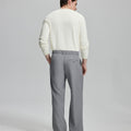Back view of wide-leg trousers: elastic waistband and rear pockets ensure comfort without compromising silhouette.