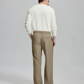 Back view of men's khaki dress pants showing elastic waistband and back pockets, emphasizing the silhouette of Extended Tab & Inner Drawstring design.