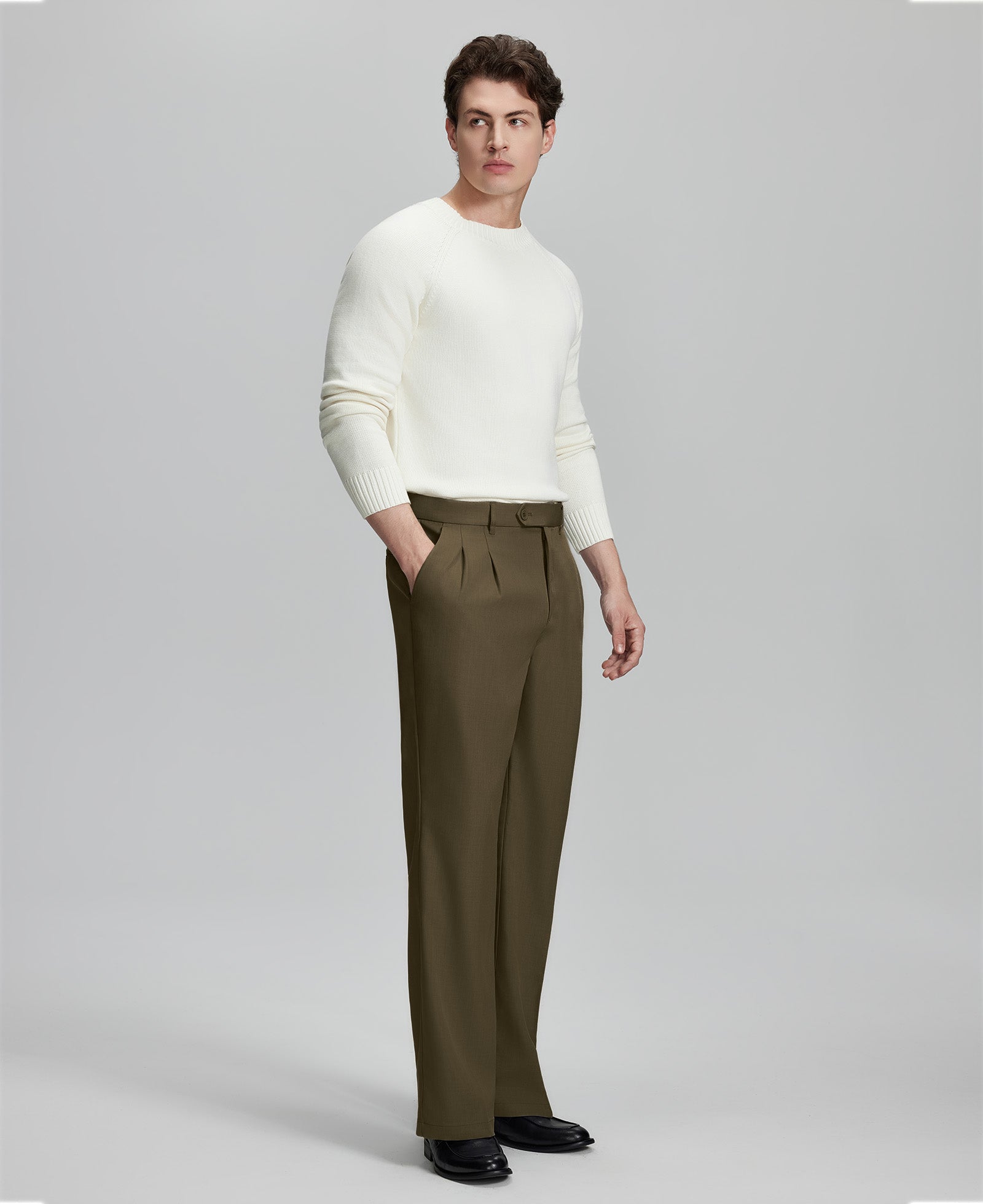Back view of men's light brown dress pants showing elastic waistband and back pockets, emphasizing the silhouette of Extended Tab & Inner Drawstring design.