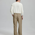 Back view showing elastic waistband and rear pockets on men's vintage-style khaki dress pants for enhanced comfort.