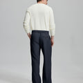 Back view showing elastic waistband and rear pockets on men's vintage-style navy dress pants for enhanced comfort.