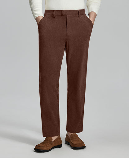 Man in white sweater, coffee Men's Corduroy Dress Pants, and brown loafers showing fabric texture and drape.