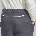 Back view of Men's Corduroy Dress Pants with detailed back pocket design for a refined look.