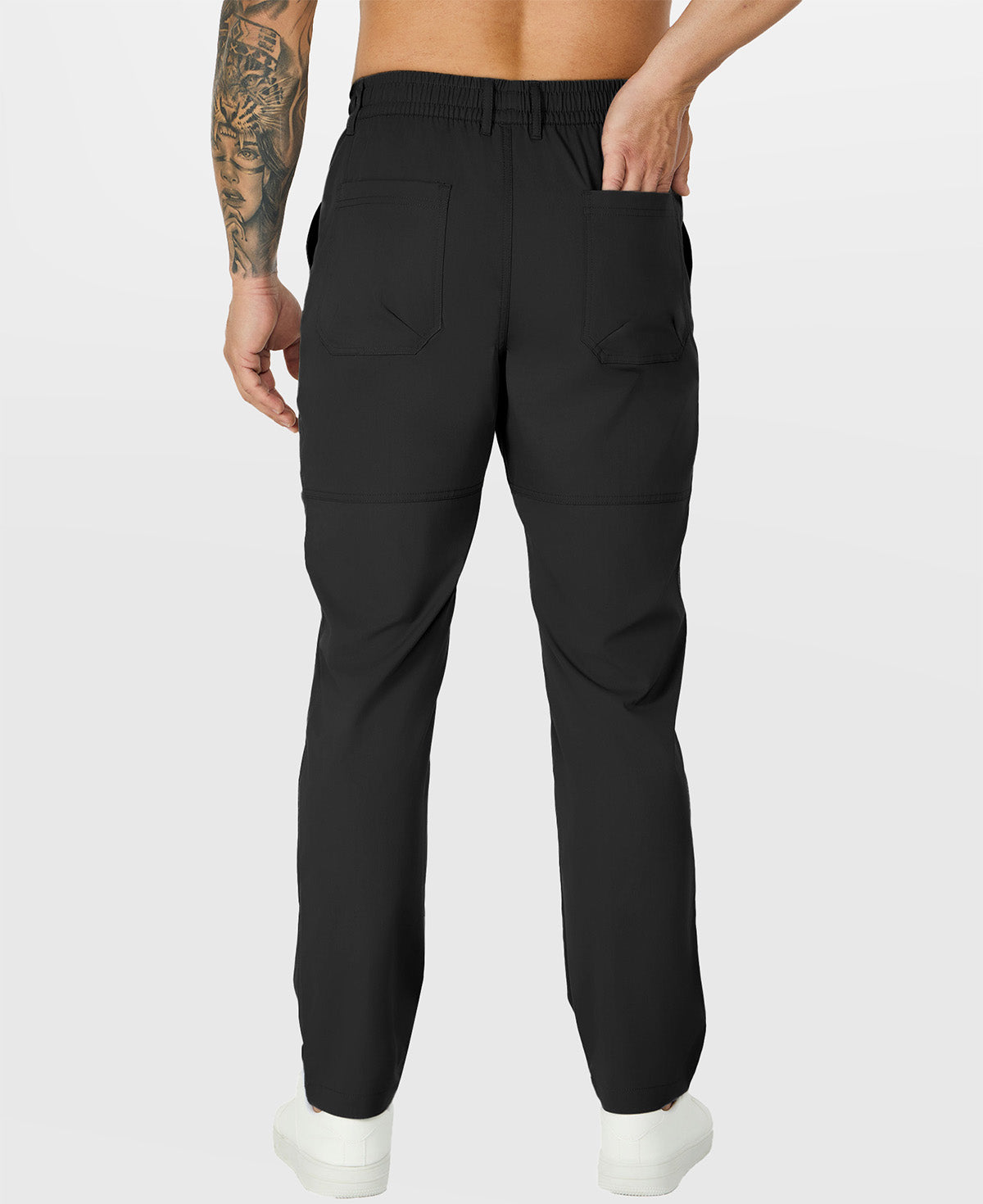 Close-up of back pocket and elastic waistband, emphasizing storage functionality and comfort in multipants.