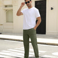 Man adjusting sunglasses, revealing side pocket details of green multipants, highlighting fit and pocket layout.