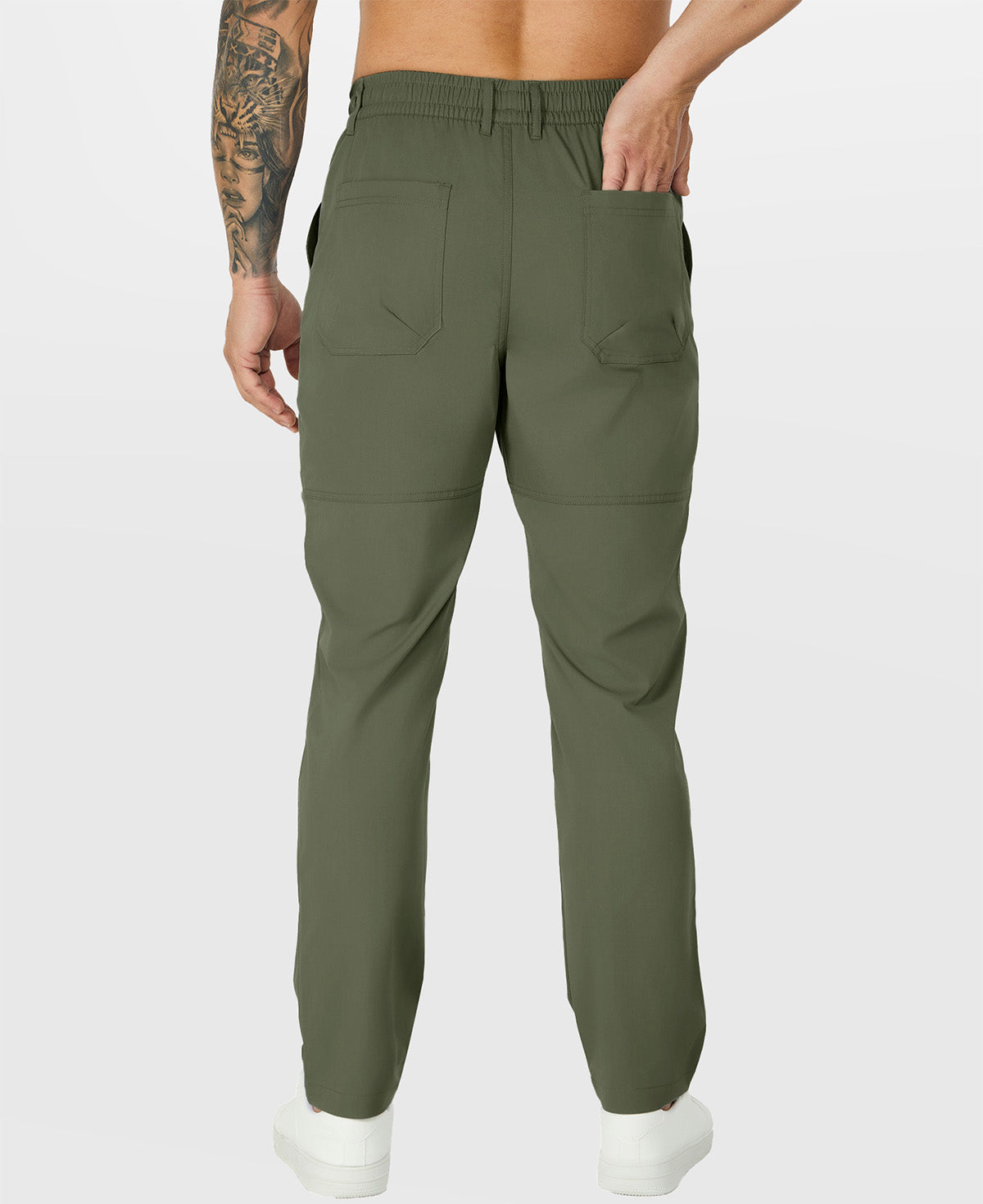 Close-up of back pocket and elastic waistband, emphasizing storage functionality and comfort in multipants.