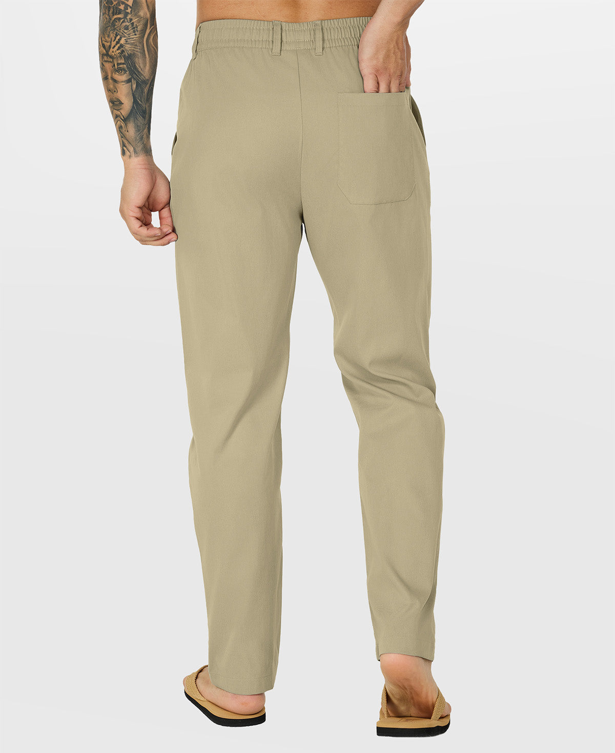 Close-up of back pocket and elastic waistband, emphasizing storage functionality and comfort in multipants.
