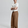 Side view of Men's Fleece Sweatpants ¨C wide-leg silhouette and cozy drape for ultimate comfort.