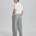 Back view of Men's Fleece Sweatpants ¨C relaxed drape and functional pockets enhance lounge-ready style.