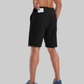 Back view of model with phone in back pocket of black shorts¡ªshowing storage space and rear silhouette design.