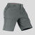 Side view of man in dark grey Men's Golf & Hiking Shorts, showing front pockets, button waistband, and side zip pocket details.