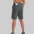 Back view of model with phone in back pocket of dark grey shorts¡ªshowing storage space and rear silhouette design.