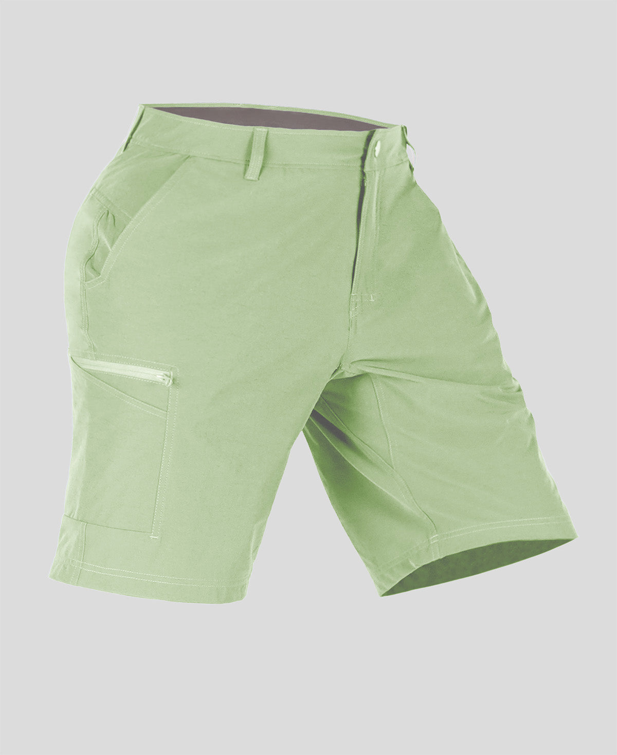 Side view of man in light green Men's Golf & Hiking Shorts, showing front pockets, button waistband, and side zip pocket details.