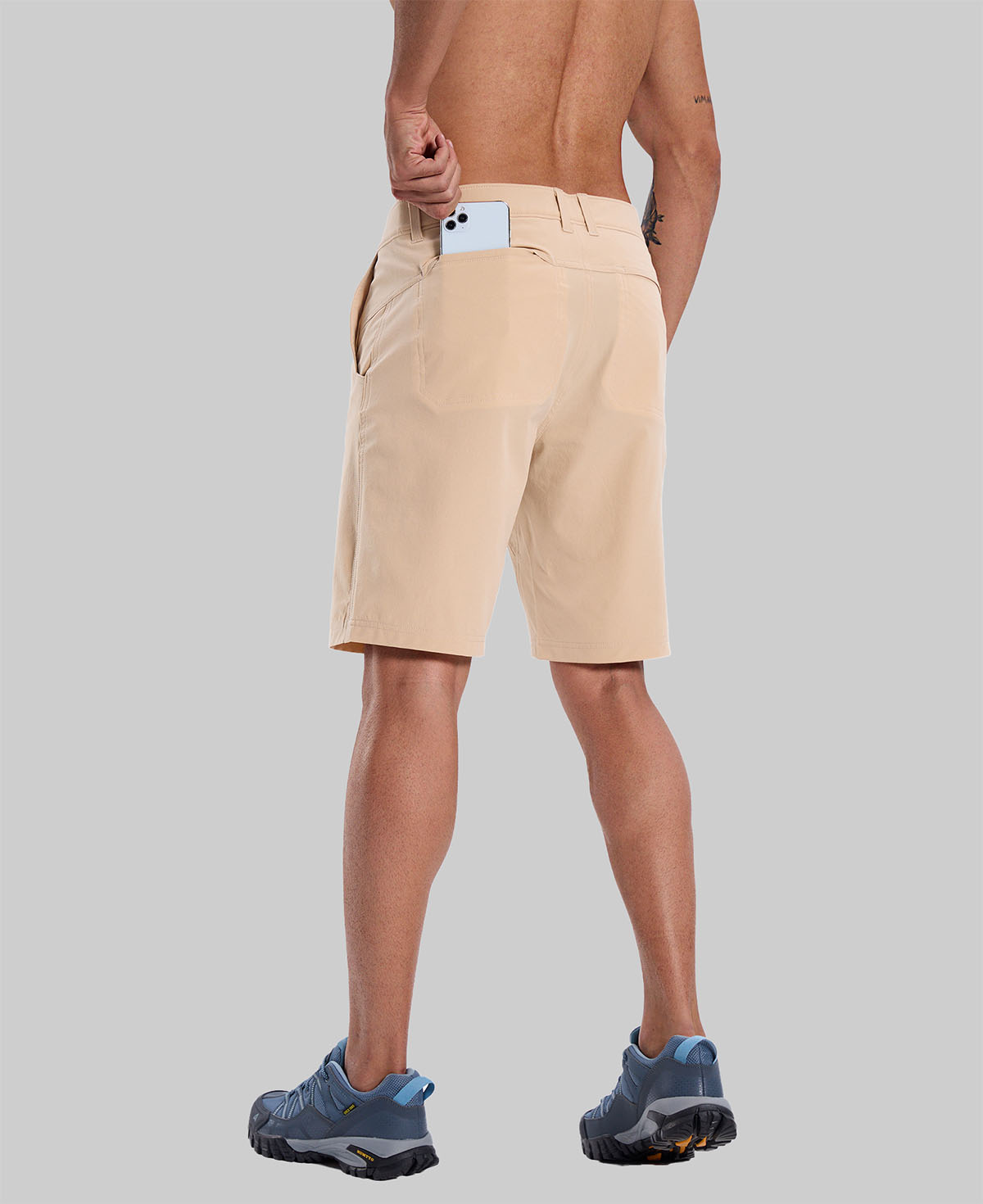 Back view of model with phone in back pocket of khaki shorts¡ªshowing storage space and rear silhouette design.