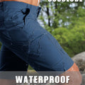 Water-resistant fabric of navy blue Men's Golf & Hiking Shorts¡ªwater beads on surface for effective spill protection.