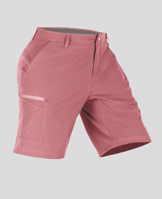 Side view of man in pink Men's Golf & Hiking Shorts, showing front pockets, button waistband, and side zip pocket details.