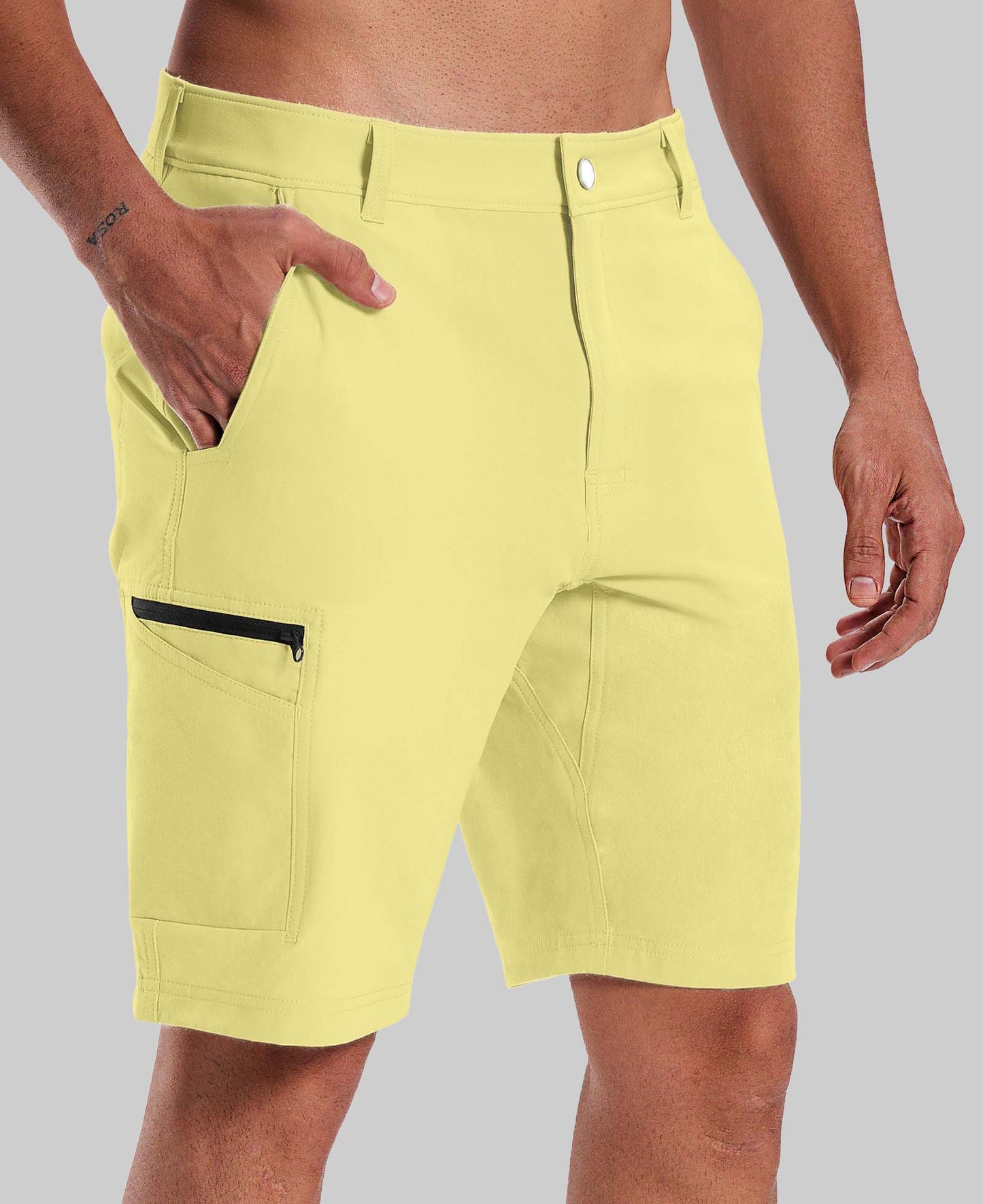 Standalone view of light yellow Men's Golf & Hiking Shorts highlighting side zip pocket and tailored cut for a sleek look.