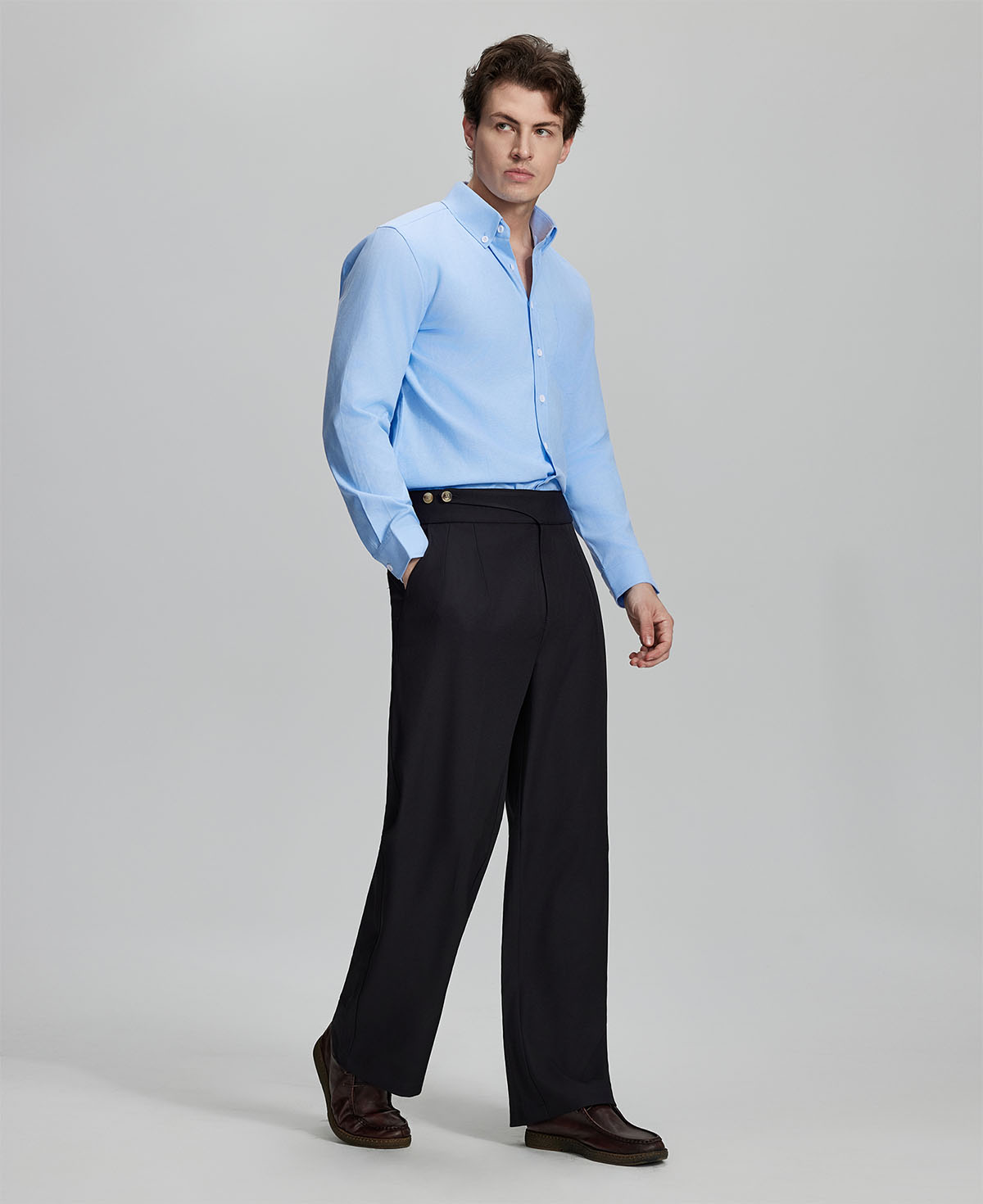 Light blue shirt paired with black Gurkha pants, clean, professional outfit for office or meetings.