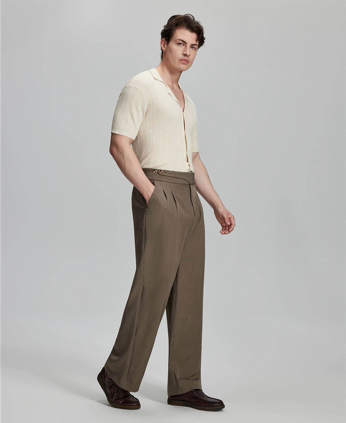 Light blue shirt paired with brown Gurkha pants, clean, professional outfit for office or meetings.
