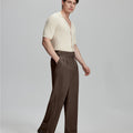 Light blue shirt paired with brown Gurkha pants, clean, professional outfit for office or meetings.