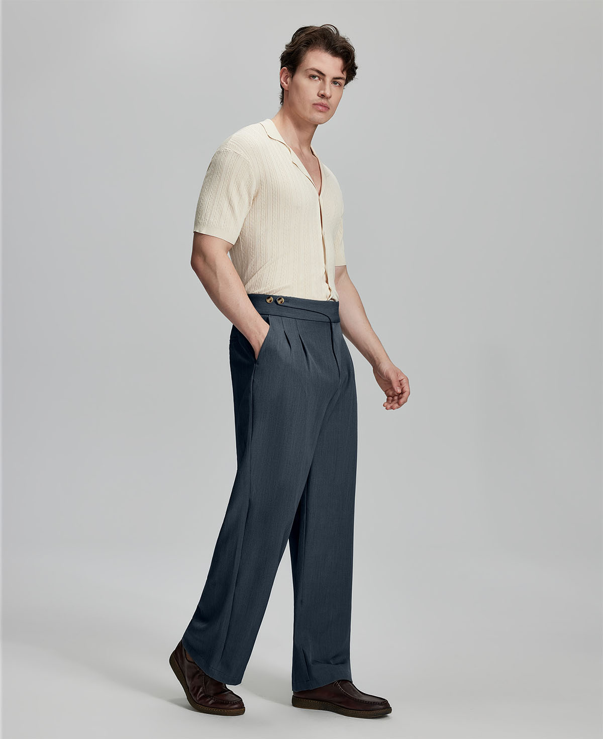 Light blue shirt paired with grey Gurkha pants, clean, professional outfit for office or meetings.