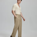 Light blue shirt paired with beige Gurkha pants, clean, professional outfit for office or meetings.