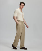 Light blue shirt paired with beige Gurkha pants, clean, professional outfit for office or meetings.