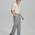 Light blue shirt paired with grey Gurkha pants, clean, professional outfit for office or meetings.