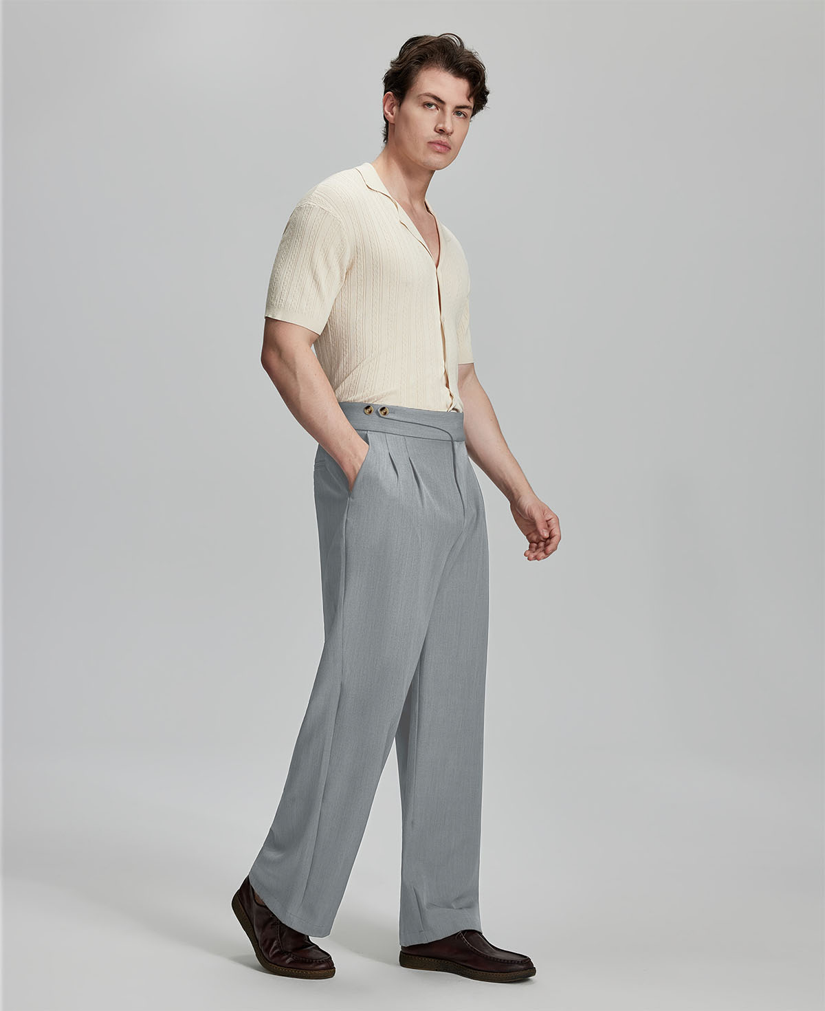 Light blue shirt paired with grey Gurkha pants, clean, professional outfit for office or meetings.