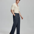Light blue shirt paired with navy Gurkha pants, clean, professional outfit for office or meetings.