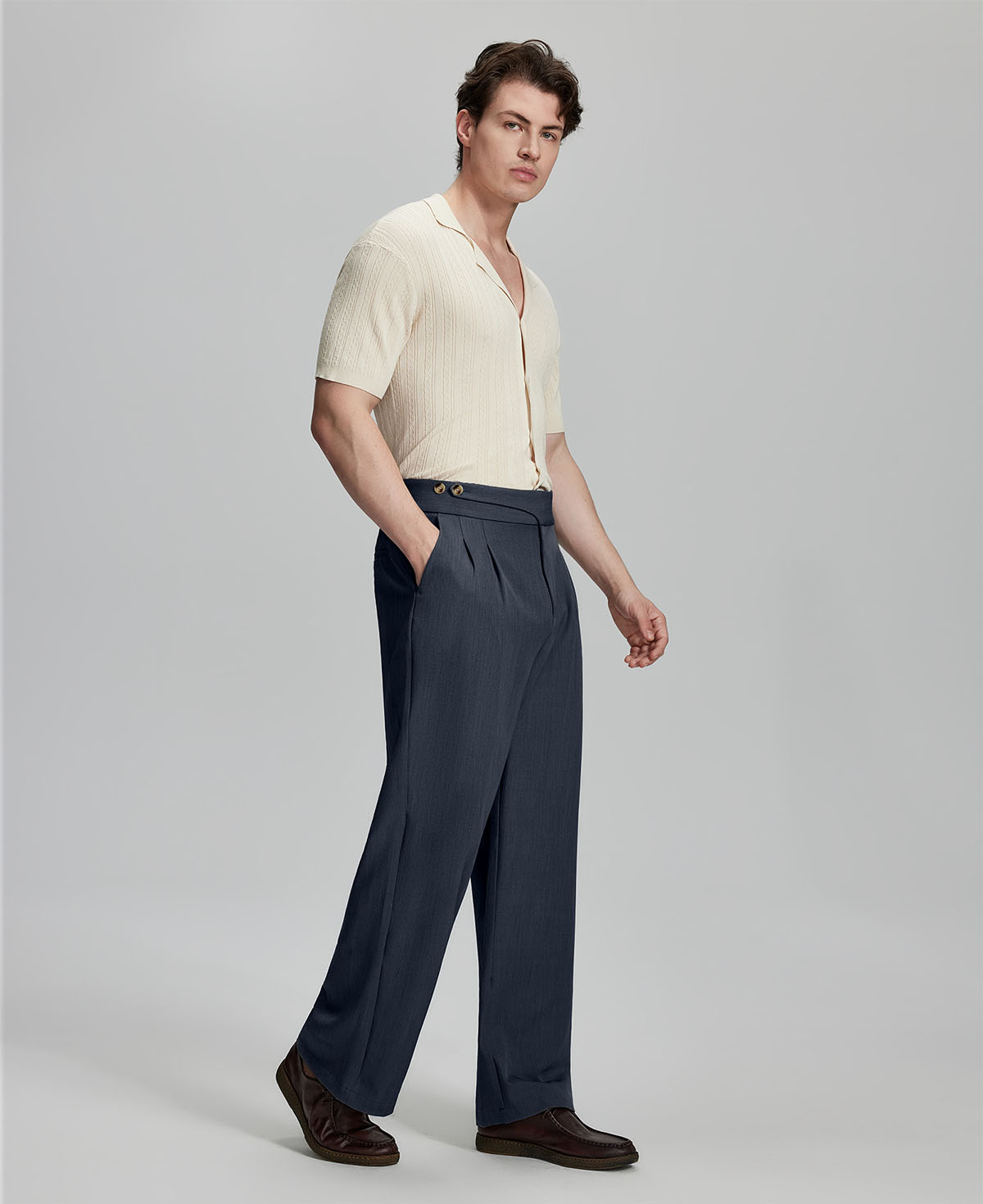Light blue shirt paired with navy Gurkha pants, clean, professional outfit for office or meetings.