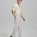 Light blue shirt paired with grey Gurkha pants, clean, professional outfit for office or meetings.
