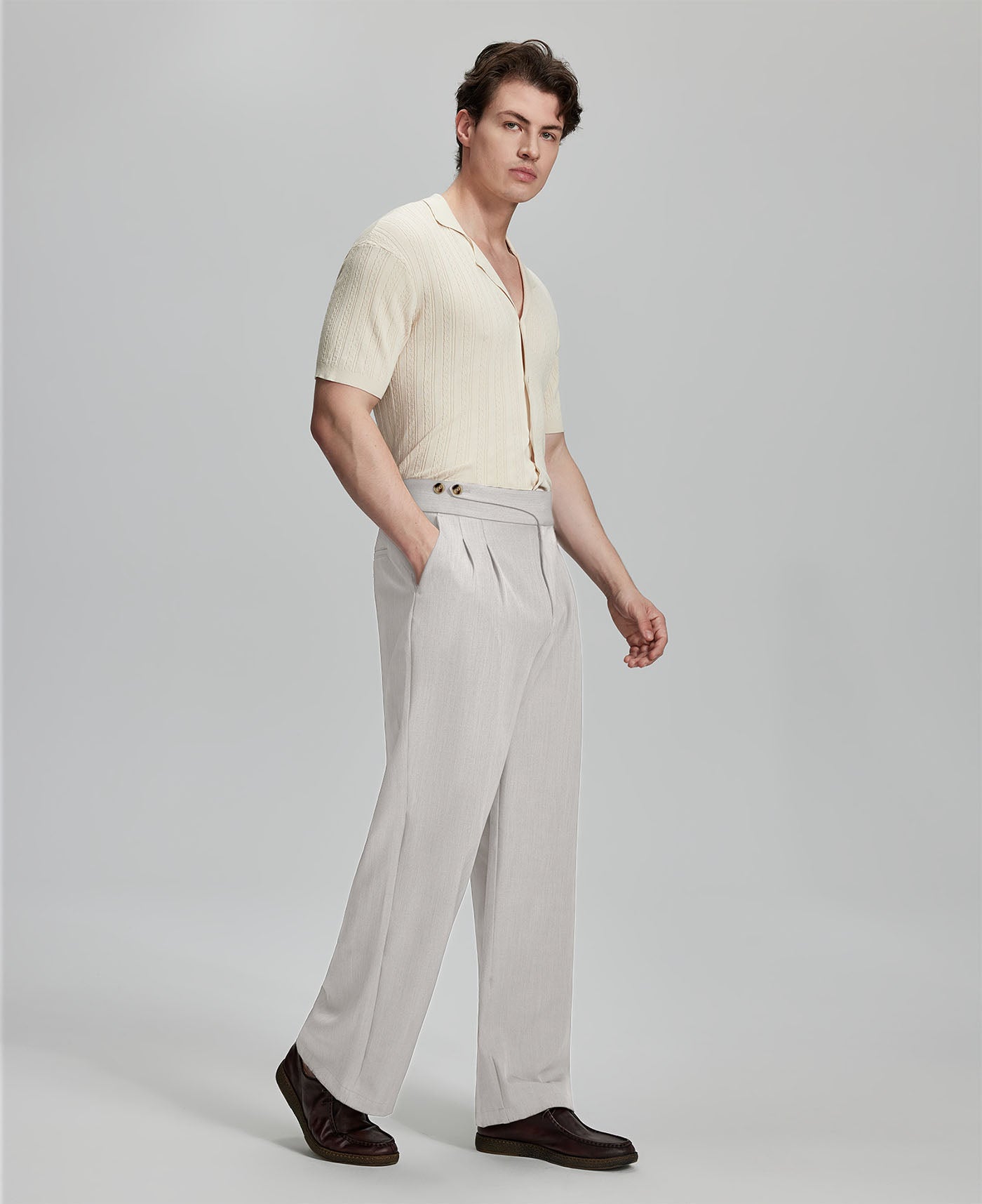 Light blue shirt paired with grey Gurkha pants, clean, professional outfit for office or meetings.