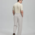 Back view of grey Gurkha pants: elastic waistband and rear pockets for comfort without sacrificing silhouette.