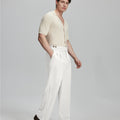 Light blue shirt paired with white Gurkha pants, clean, professional outfit for office or meetings.
