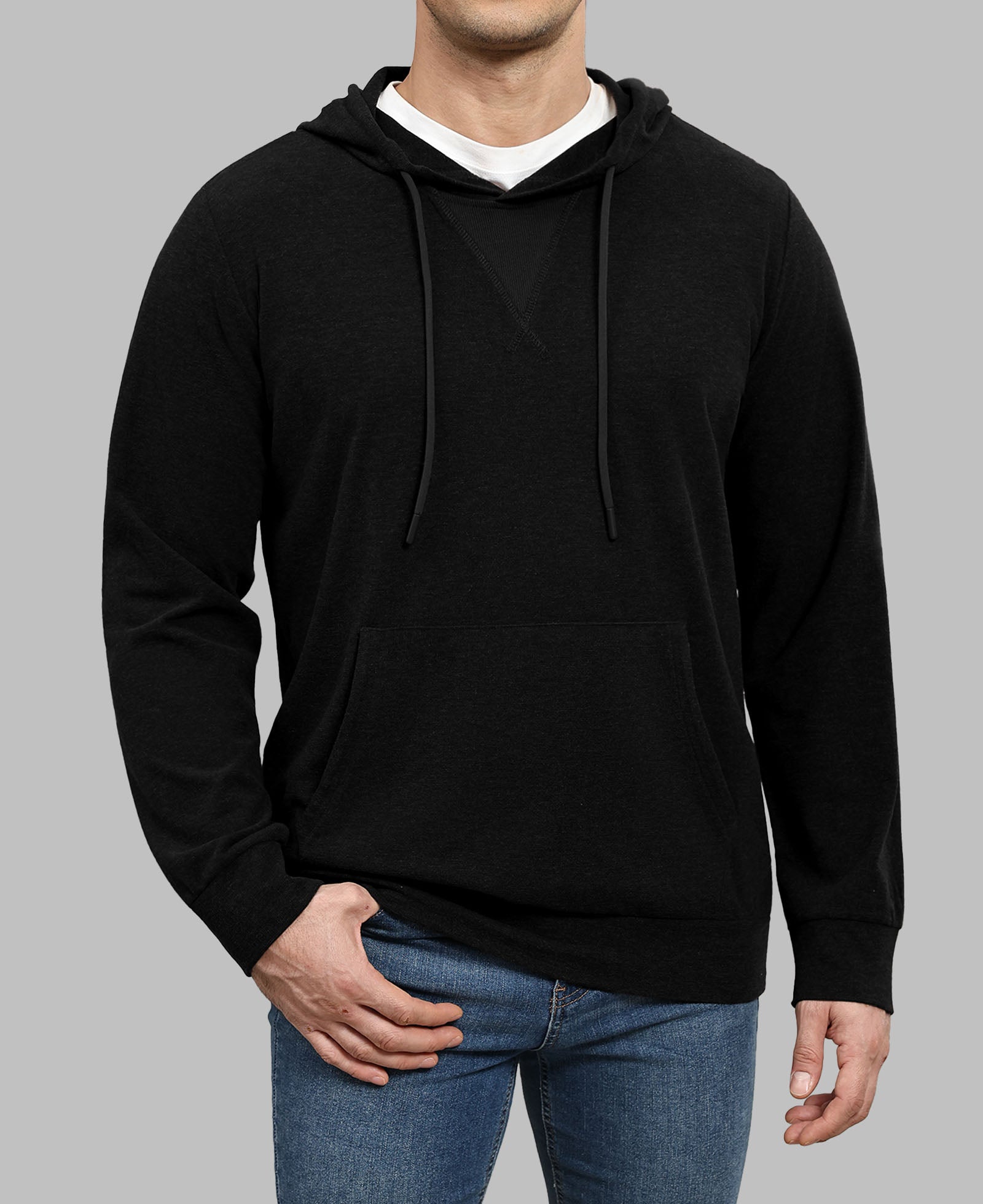 Model in black Men's Hoodie Pullover Sweater ¨C Cashmere-Like Fabric with jeans, showing clean fit and everyday style.