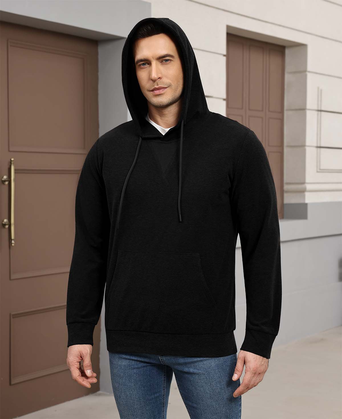 Hood-on look of black Men's Hoodie Pullover Sweater ¨C soft, relaxed vibe with cashmere-like texture.