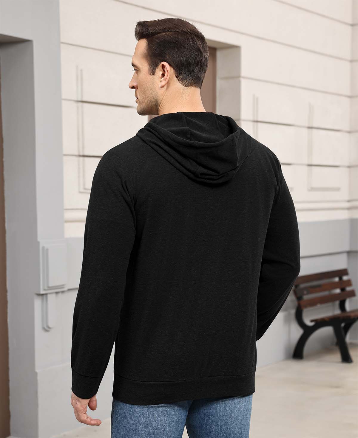 Back view of black Men's Hoodie Pullover Sweater ¨C smooth drape and minimalist silhouette in cashmere-like fabric.