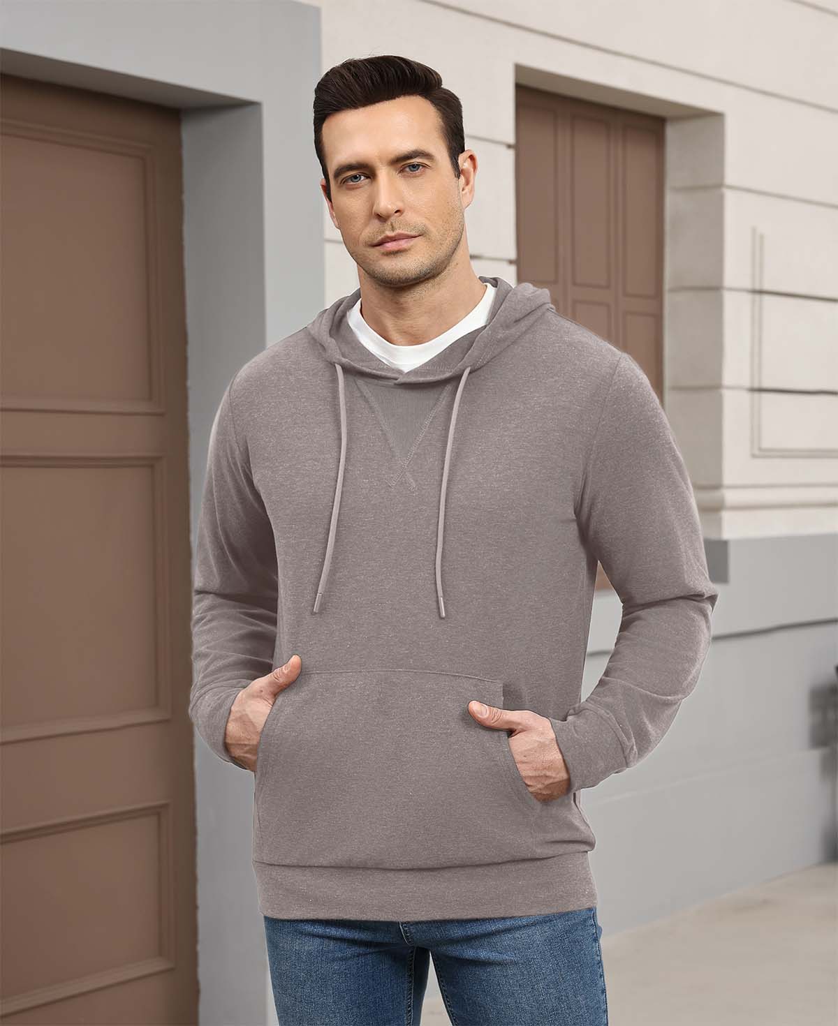 Wearing brown Men's Hoodie Pullover Sweater outdoors, hood adds casual comfort for daily errands or walks.