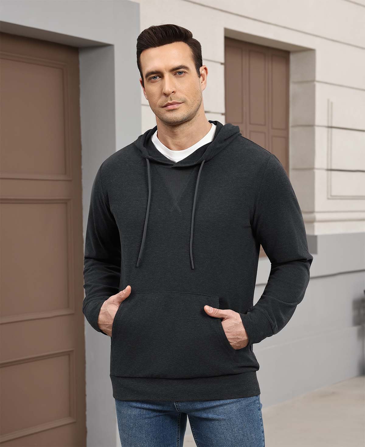 Wearing grey Men's Hoodie Pullover Sweater outdoors, hood adds casual comfort for daily errands or walks.